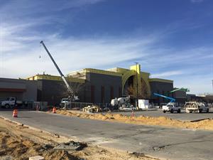 Three cranes work on the front exterior of the theater. - , Utah