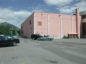 Several cars in the parking lot, with the theater in the background. - , Utah