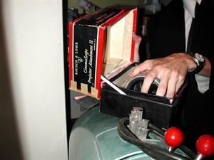 An employee opens a box labeled, "Bausch & Lomb CinemaScope Projector Attachment II." - , Utah