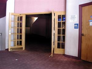 The french doors at the north end of the lobby, with a door to the handicapped restroom on the right. - , Utah