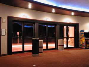 The three sets of double doors that make up the front entrance.  The original glass doors were replaced in 1998 after an accident on Highland Drive sent a motorcycle crashing into the theater lobby. - , Utah