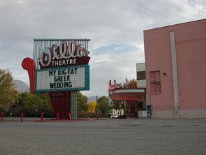 Looking across the parking lot to the sign and entrance.  'My Big Fat Greek Wedding' appears on the sign. - , Utah