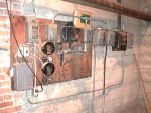Electrical boxes on the west wall of the boiler room. - , Utah