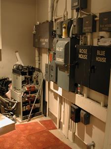 A small room just to the north of the main projection booth holds circuit breakers and fuses for "Spot", "Picture Mach Lamp", "MG Set Disconnect," Rose House", and "Blue House". - , Utah
