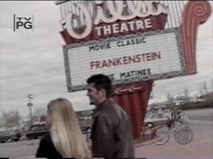 A couple passes the island marquee, which reads, "Movie Classic.  Frankenstein.  Movie Matinee." - , Utah