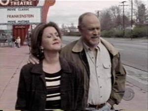 Actors portraying Russell and Claire Greene, with the marquee in the background. - , Utah
