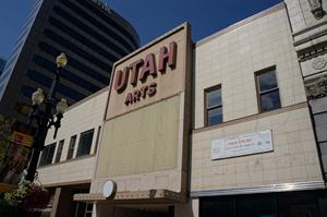 A banner hangs next to the blank marquee with the text, "Historic Pantages / Utah Theater.  Free Tours. July 9, July 14, August 11, 10:00 a.m. to 12:00 p.m.  Presented by Utah Heritage Foundation in partnership with the Redevelopment Agency of Salt Lake City." - , Utah