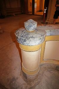 The start of the marble banister for the ramp to the mezzanine, with the entrance hall in the background. - , Utah