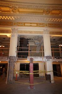 Looking from the lobby up through holes cut in the mezzanine and balcony to accomodate an escalator. After the removal of the escalator during an incomplete renovation attempt, the opening in the balcony floor was temporarily covered. - , Utah