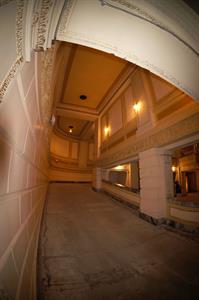 The lower portion of the ramp, taken close to the wall with a wide angle lens.  On the right side of the ramp, portions of the lobby are visible through openings between decorative pillar.s - , Utah
