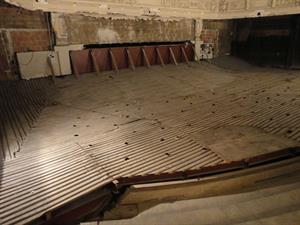 This section of flooring was added in 1968 to divide the balcony from the main auditorium below.  Along the bottom of the photo are the original risers of the balcony. - , Utah