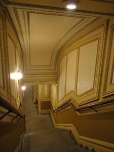 A staircase with handrails on either side.  Halfway down is a small landing. - , Utah