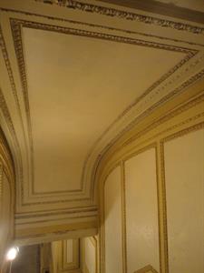 Decorative borders divide the curved ceiling of the staircase, and its walls, into panels.   - , Utah