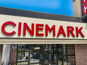 'Cinemark' in red letters fills the photo, with a partial view of the theater entrance below it. - , Utah