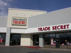 The entrance of the theater is in a corner of the strip mall.