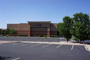 Seven parking spaces in front of 24 Hour Fitness mark the former entrance of the Midvalley Cinemas, replaced in 2016 by the Regal Crossroads 14 & RPX. - , Utah