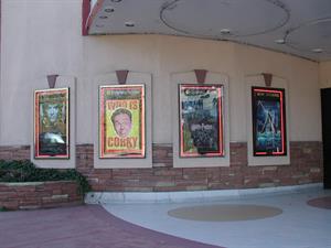A curved wall holds posters for 'The Two Towers,' 'Who is Corky,' 'Harry Potter,' and 'Atlantis.' - , Utah