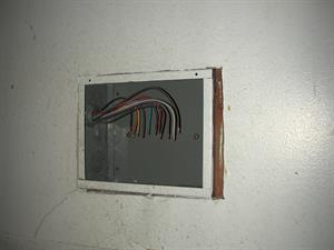 A box in the wall below the projection windows holds 11 colored wires, neatly arranaged after exiting conduit. - , Utah