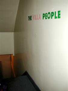 Another view of "THE VILLA PEOPLE" on the wall outside the projection booth. - , Utah