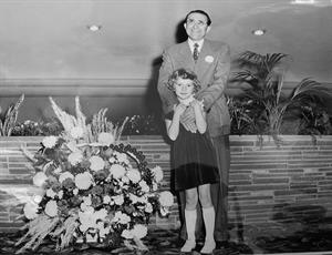 David K. Edwards and his daughter, standing in front of the planting box in the upper lobby. - , Utah