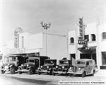 Vintage cars park in front of the Murray City Power & Light, with the Murray Theatre in the background. - , Utah