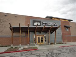 The entrance to the REI store is smaller than the original entrance to the theater, and pushed all the way to the left.