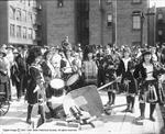 Members of a band stand around an overturned wheelbarrow. - , Utah