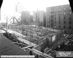 Construction of the sloping floor of the lower seating area.  The basement of the stage is on the right. - , Utah