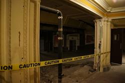 Caution tape marks the former location of a wall dividing the concession stand from the projection booth. - , Utah