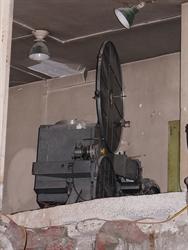The heavy film projector was pushed into the back corner of the booth. - , Utah