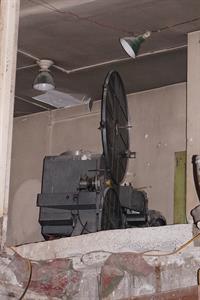 A heavy portion of a movie projector, pushed toward the back of the booth. - , Utah