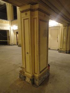 A four-sided pillar between the entrance hall (out of the photo on the right) and the ramp to the mezzanine (behind and left.) - , Utah