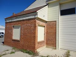Boarded up windows on the left side of the building's front. - , Utah