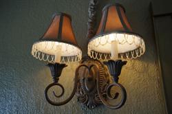 Twin lamps with shades, on the south wall. - , Utah