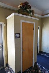 The entrance to the ticket booth, with exterior doors on either side. - , Utah