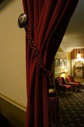 A rope holds back the drapery separating the auditorium from the lobby. - , Utah
