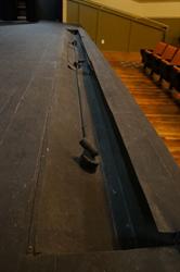 Recessed area for footlights along the front of the stage. - , Utah