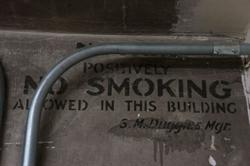 A notice on the wall:  "Positively no smoking allowed in this building.  S. M. Duggins, Mgr." - , Utah
