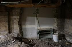 A new section of wall where the furnace room connects with the area under the auditorium. - , Utah