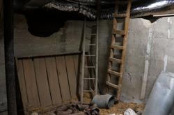 Non-structural concrete walls below the trap door. - , Utah