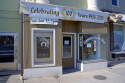 A "Celebrating 100 Years" banner hangs above the Gunnison Barber Shop. - , Utah