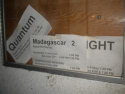 Showtimes for 'Madagascar 2' on Thanksgiving 2008 hang in a poster case. - , Utah