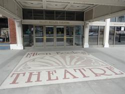 The name of the theater is written in the sidewalk below the entrance. - , Utah