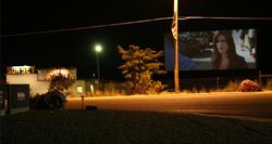  A movie on the screen of the Sunset Drive-In in 2007. - , Utah