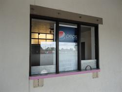 A Pepsi sign still hangs in the ticket booth after the theater's closing. - , Utah
