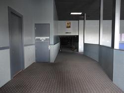Looking through the exit doors toward the auditorium hallway. - , Utah