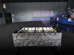 A foosball table remains in the lobby after the theater closed. - , Utah