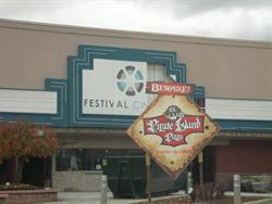 A sign in front of the theater entrance reads, 'Beware! Pirate Island Pizza. Pirates be comin'.' - , Utah