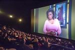 Fans of Oprah Winfrey watch her final show on the IMAX screen at the Clark Planetarium. - , Utah