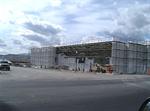 Scaffolding surrounds the theater as the first coat of finish is applied. - , Utah